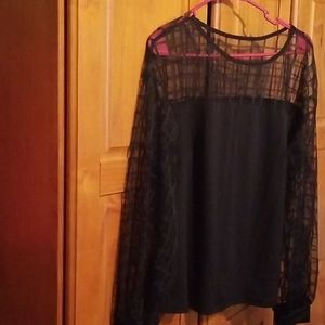 Black blouse with sheer sleeves